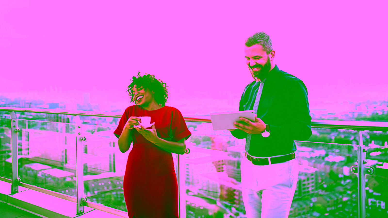 People laughing on a rooftop