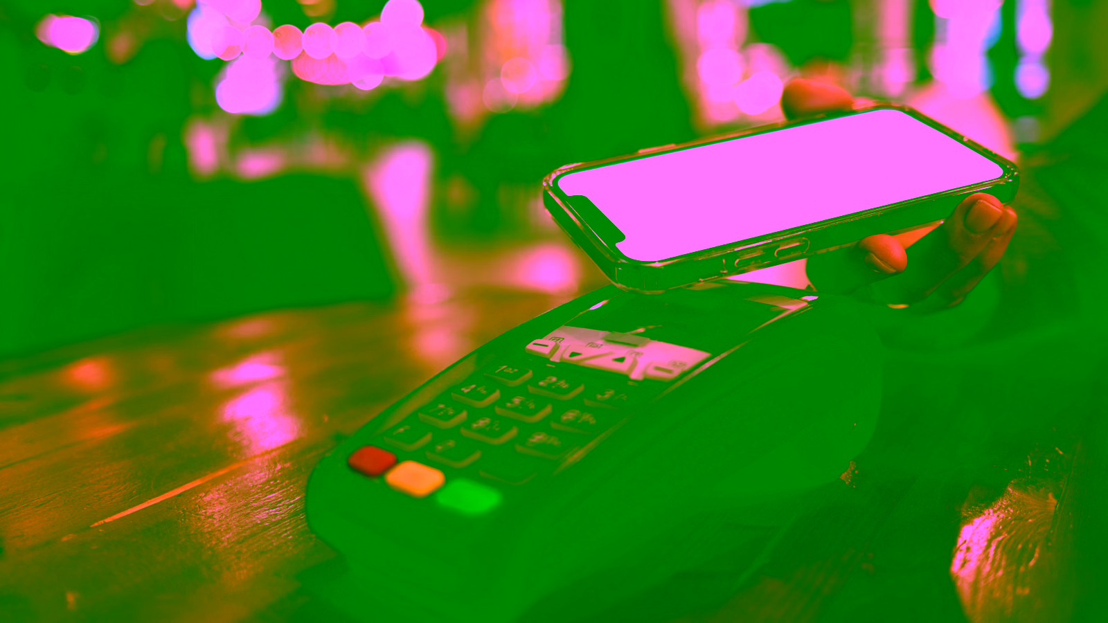 Smartphone contactless payment at checkout terminal