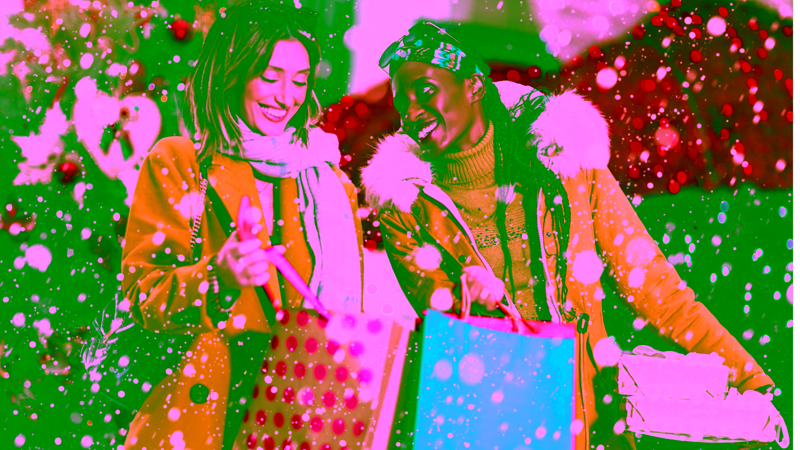 Women holiday shopping in the snow