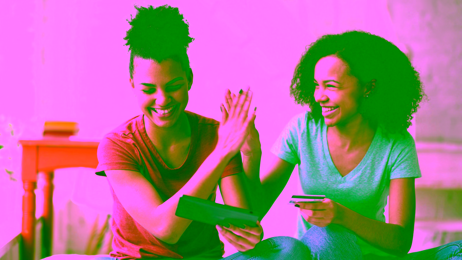 Friends celebrating an online purchase