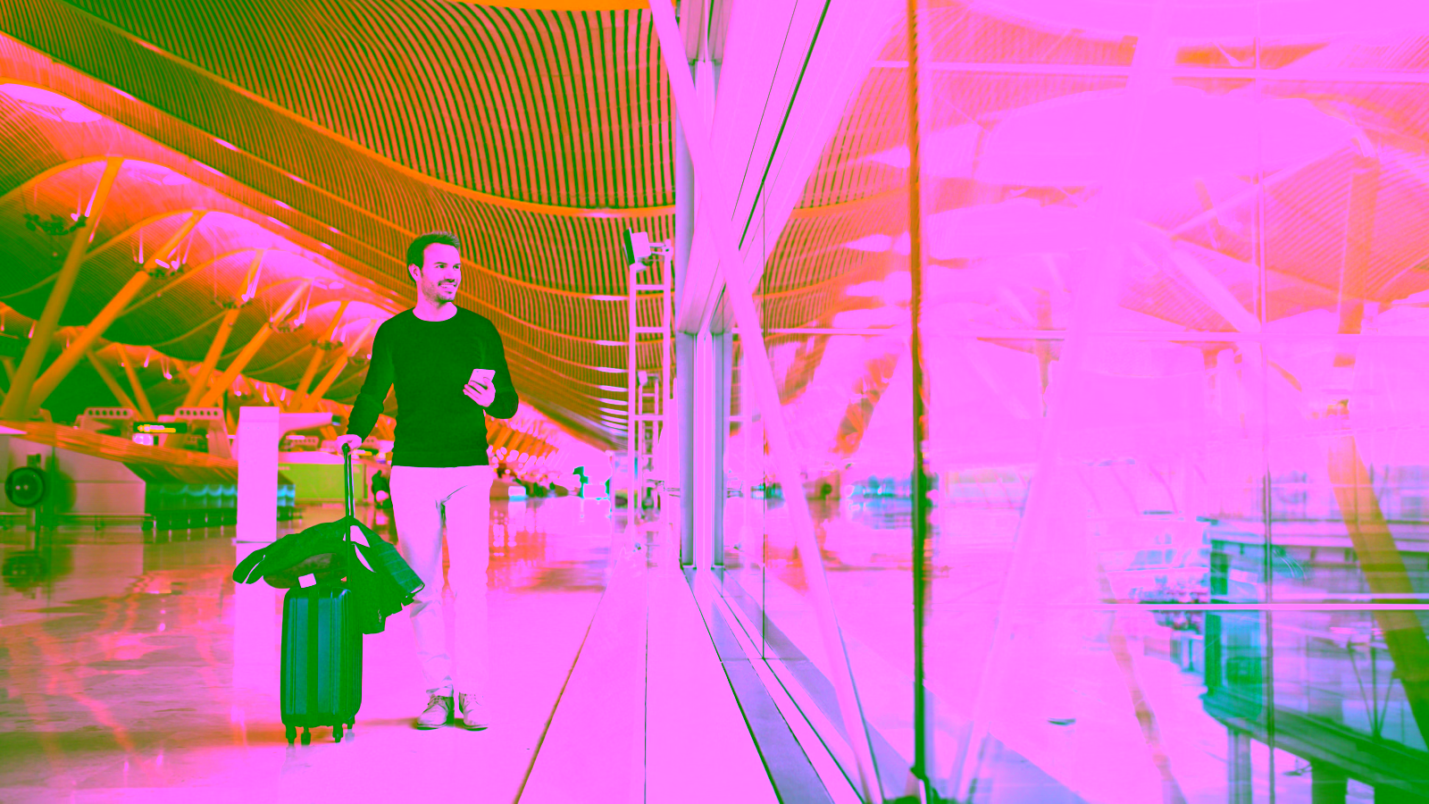 Traveler with luggage at airport