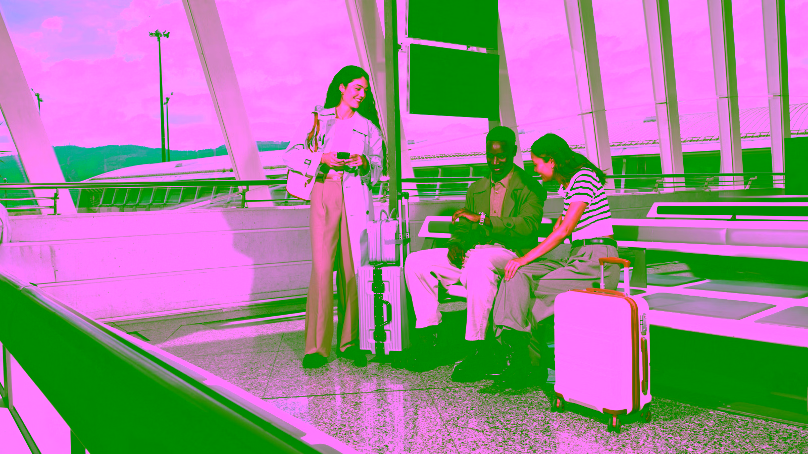 Travelers waiting at an airport terminal