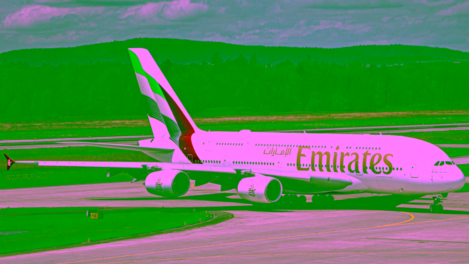 Emirates A380 taxiing on runway