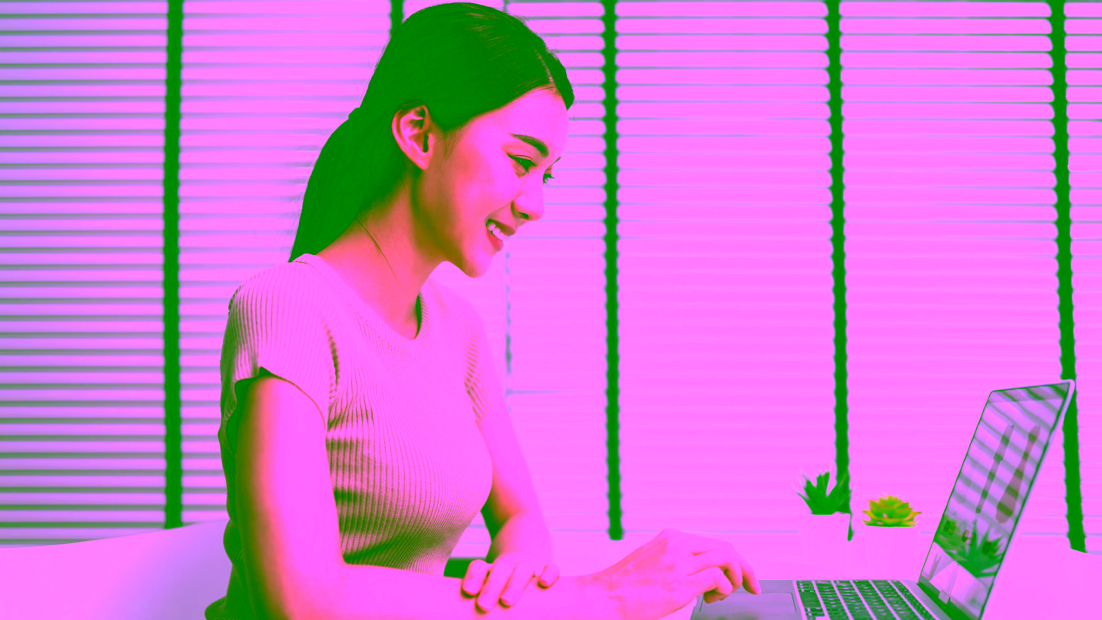 Smiling woman shopping online at desk