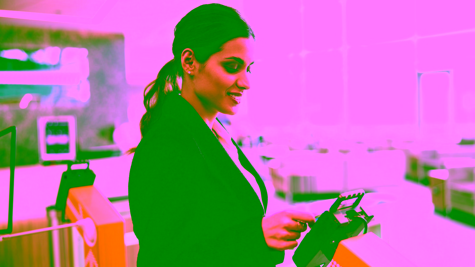 Business owner using credit card at payment terminal