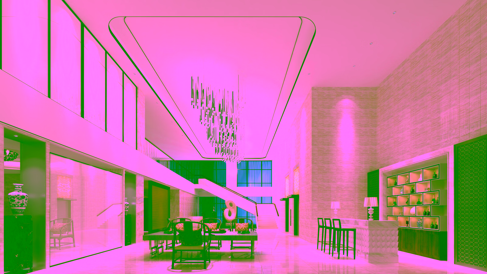 Luxury hotel lobby with chandelier and marble interior.