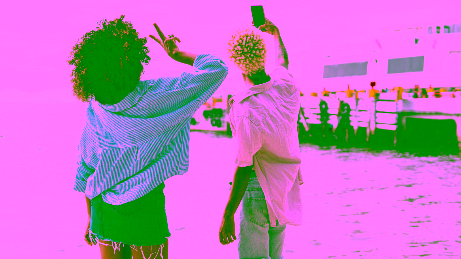 Friends taking a waterfront selfie