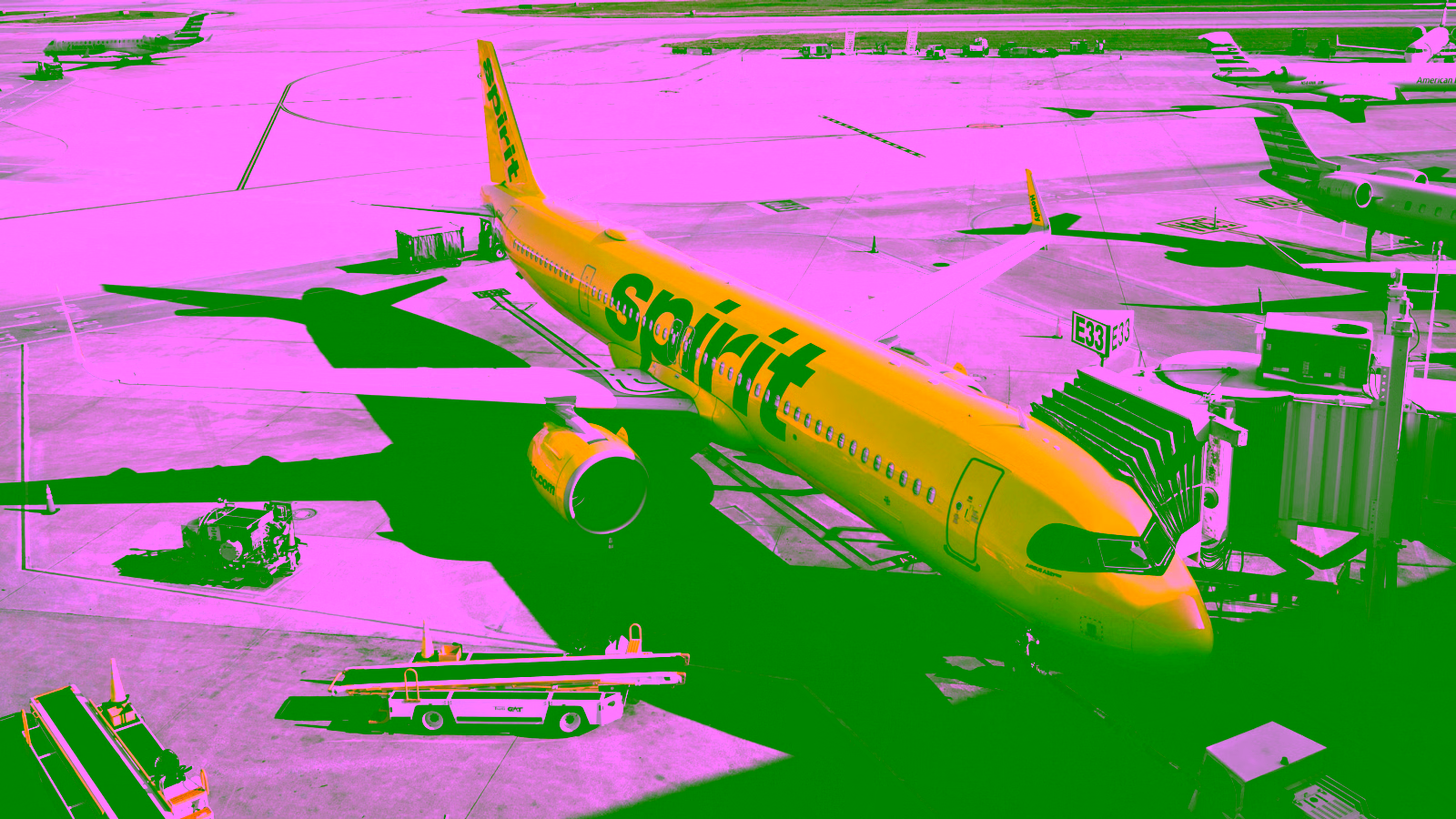 Spirit Airlines plane at airport gate