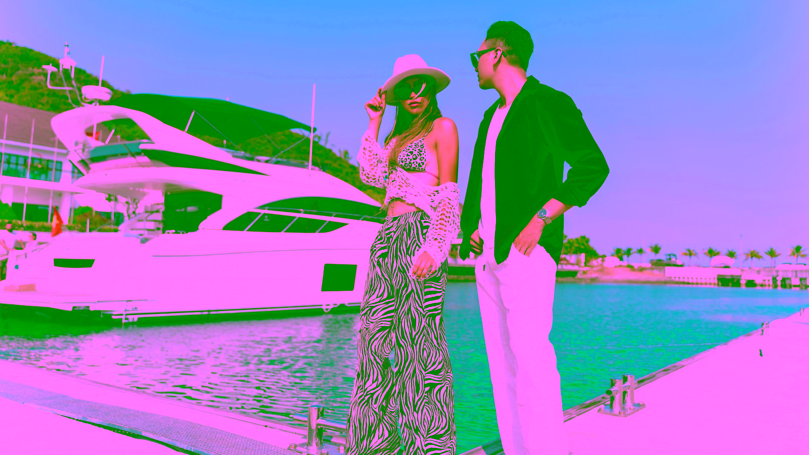 Couple at luxury yacht marina