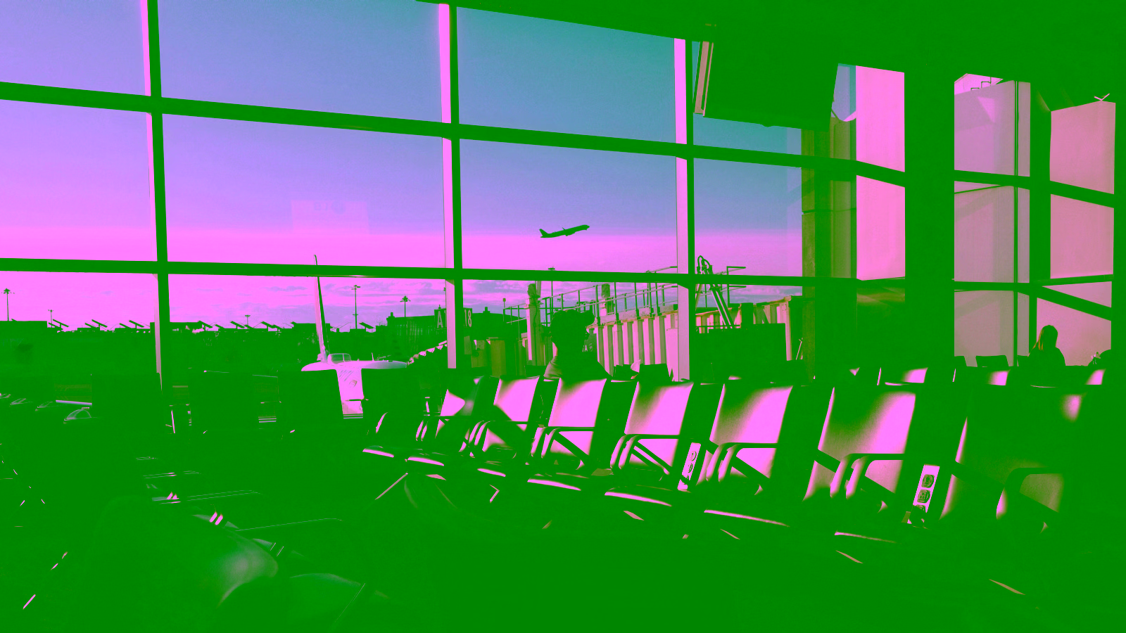 Airport lounge with plane takeoff