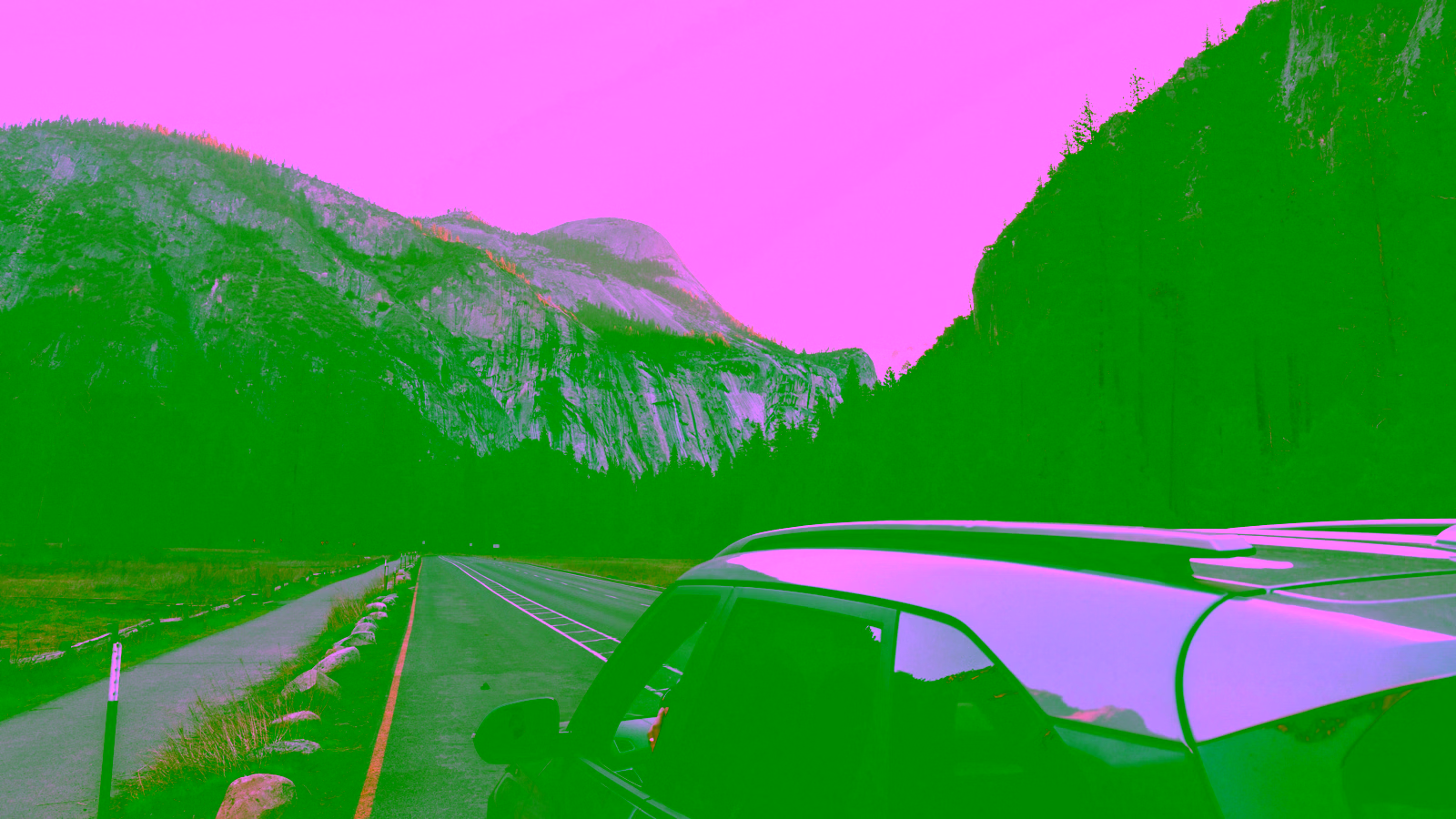 Car on scenic mountain road trip adventure