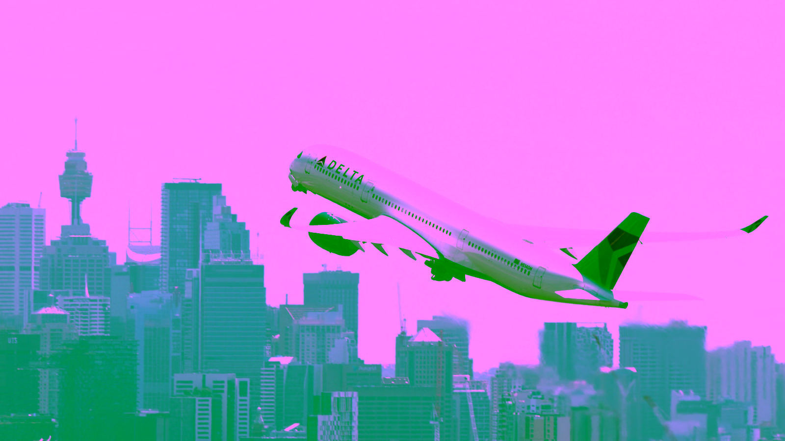 Delta plane taking off over city skyline
