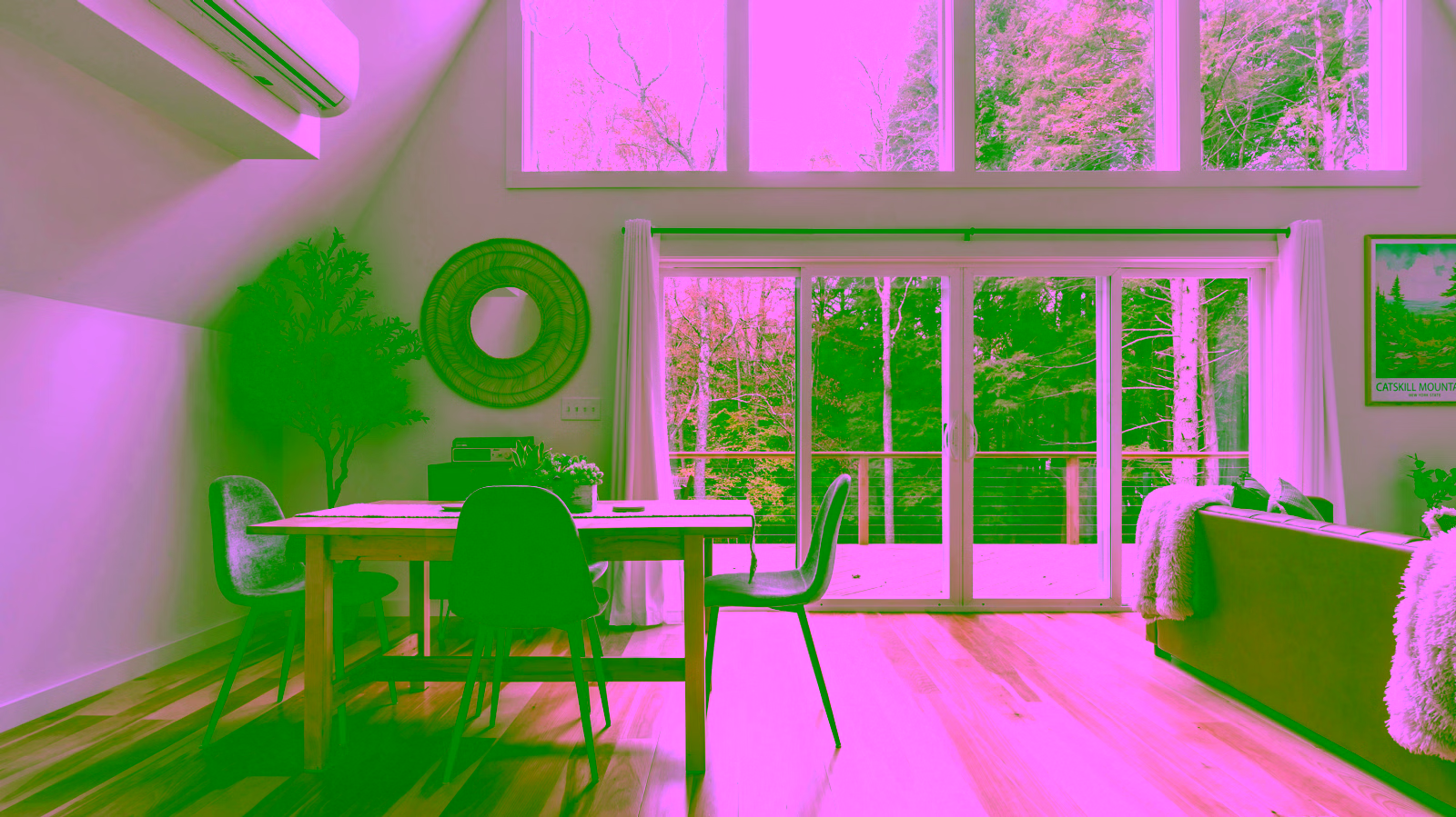 Modern dining area with forest view