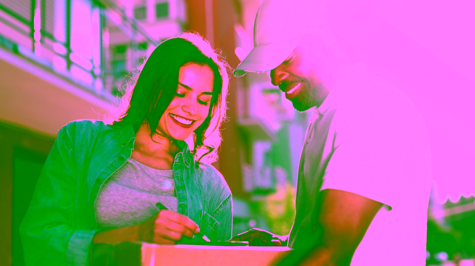 Customer signing for package delivery
