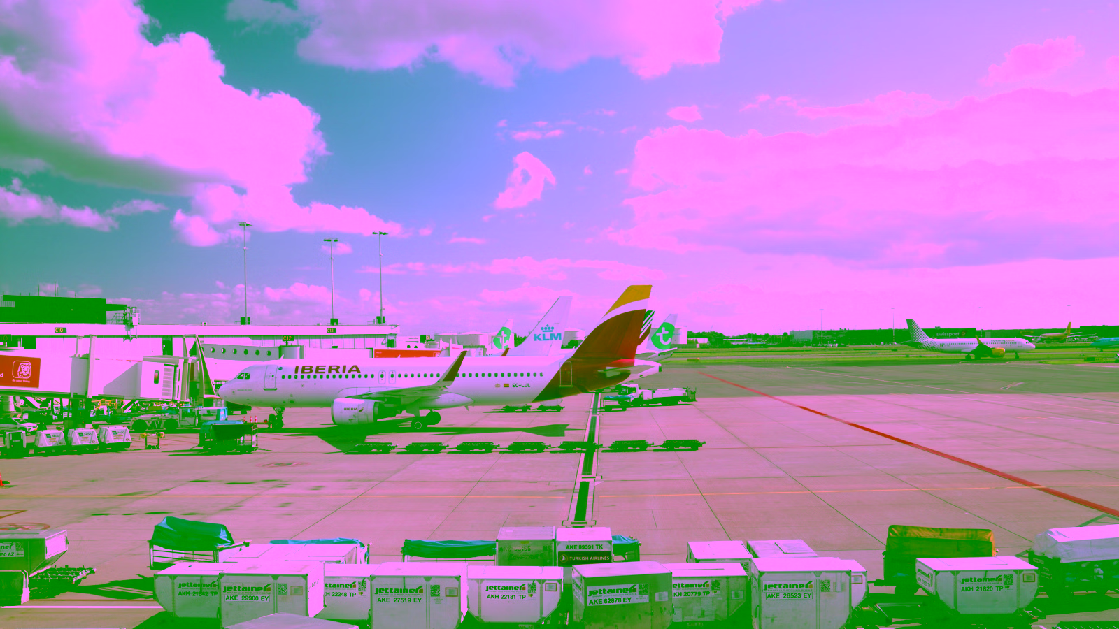 Iberia airplane at airport gate