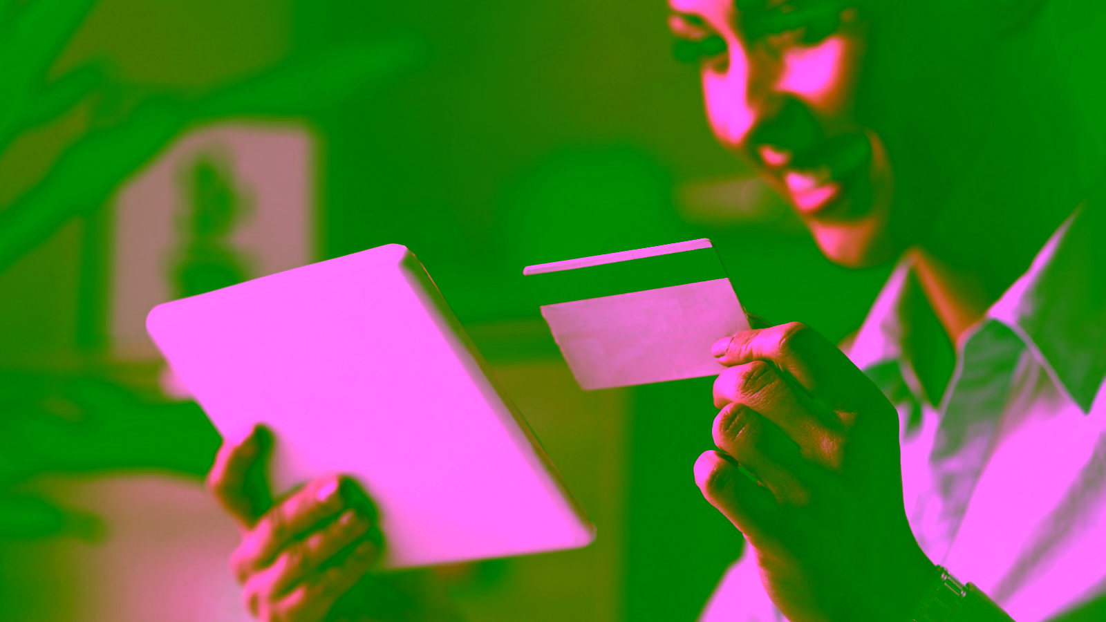 Person holding credit card