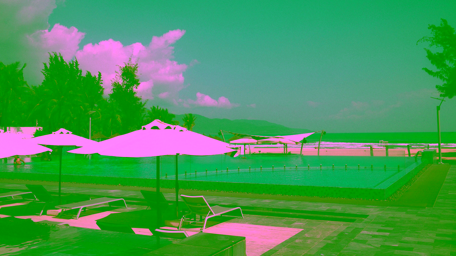 Beachfront resort pool with ocean view