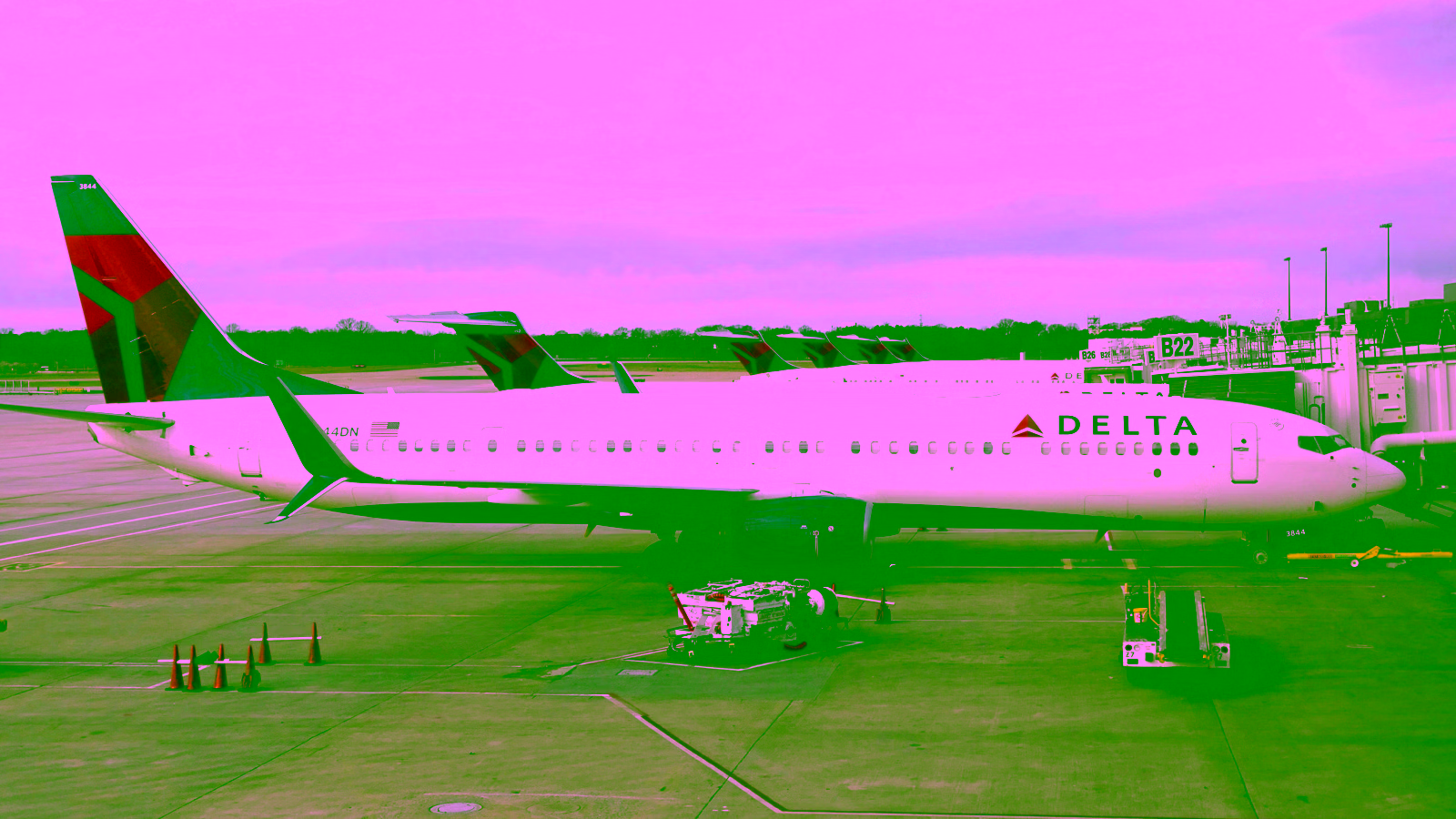 Delta Air Lines airplane parked at an airport gate