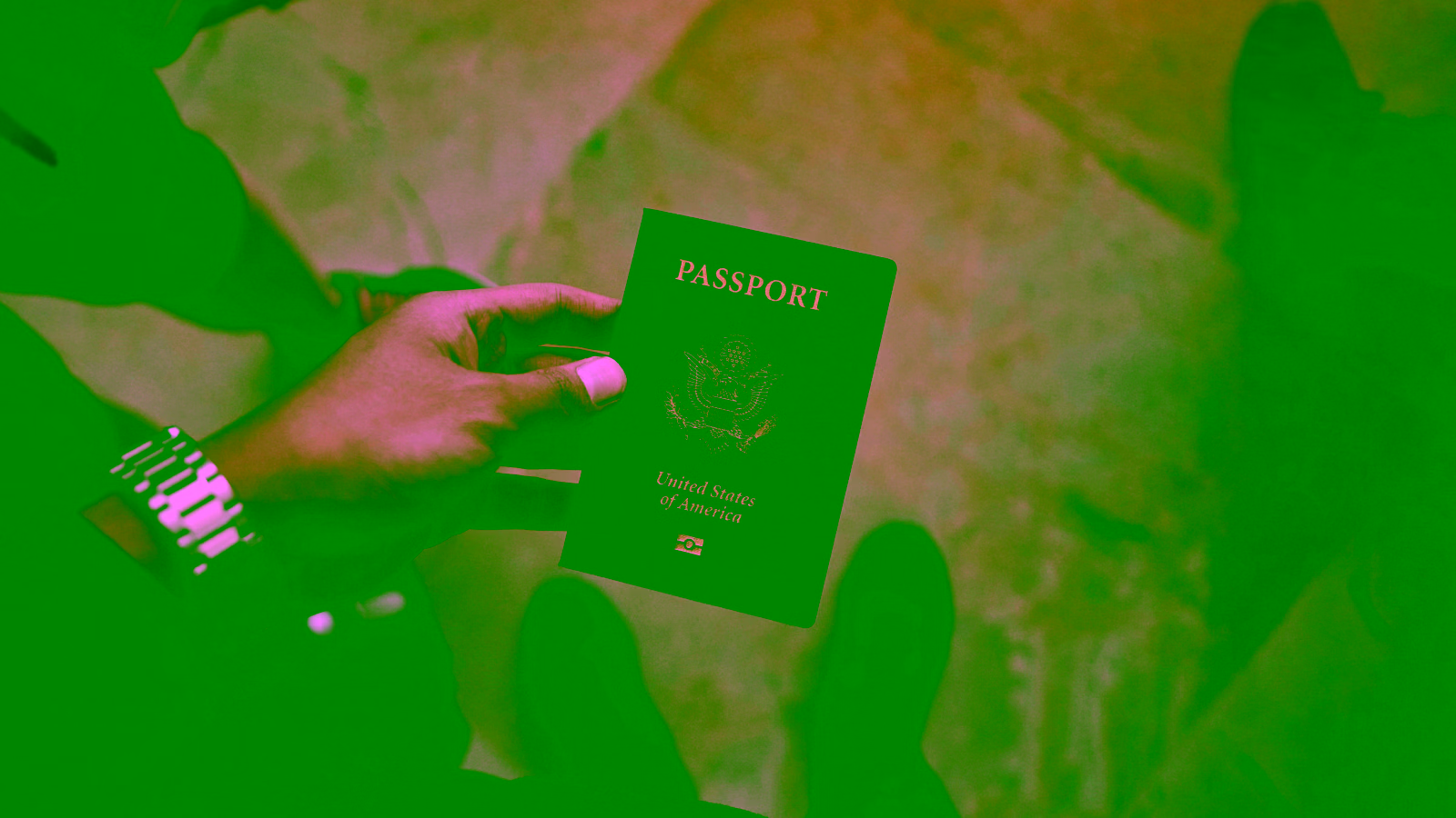Traveler holding a U.S. passport before a trip