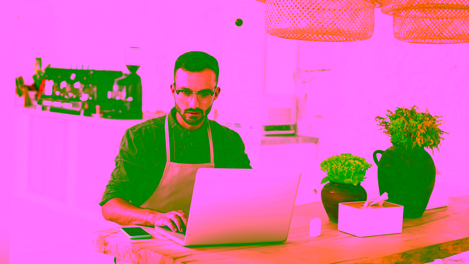 Business owner working on a laptop