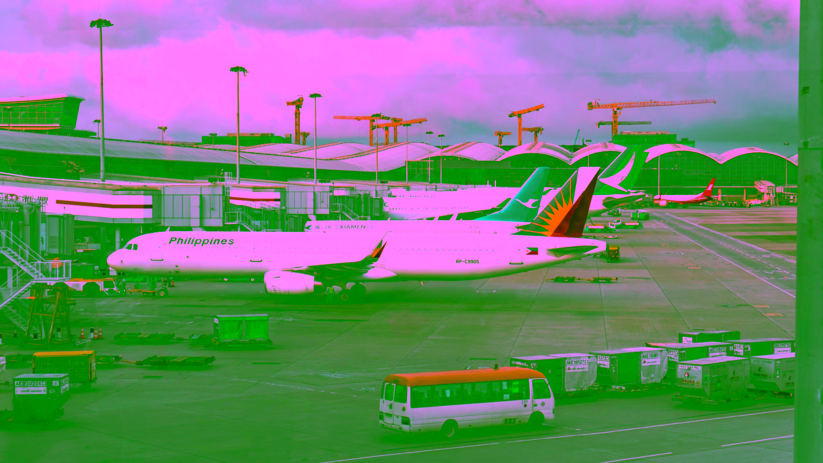 Philippine Airlines aircraft parked at airport gate