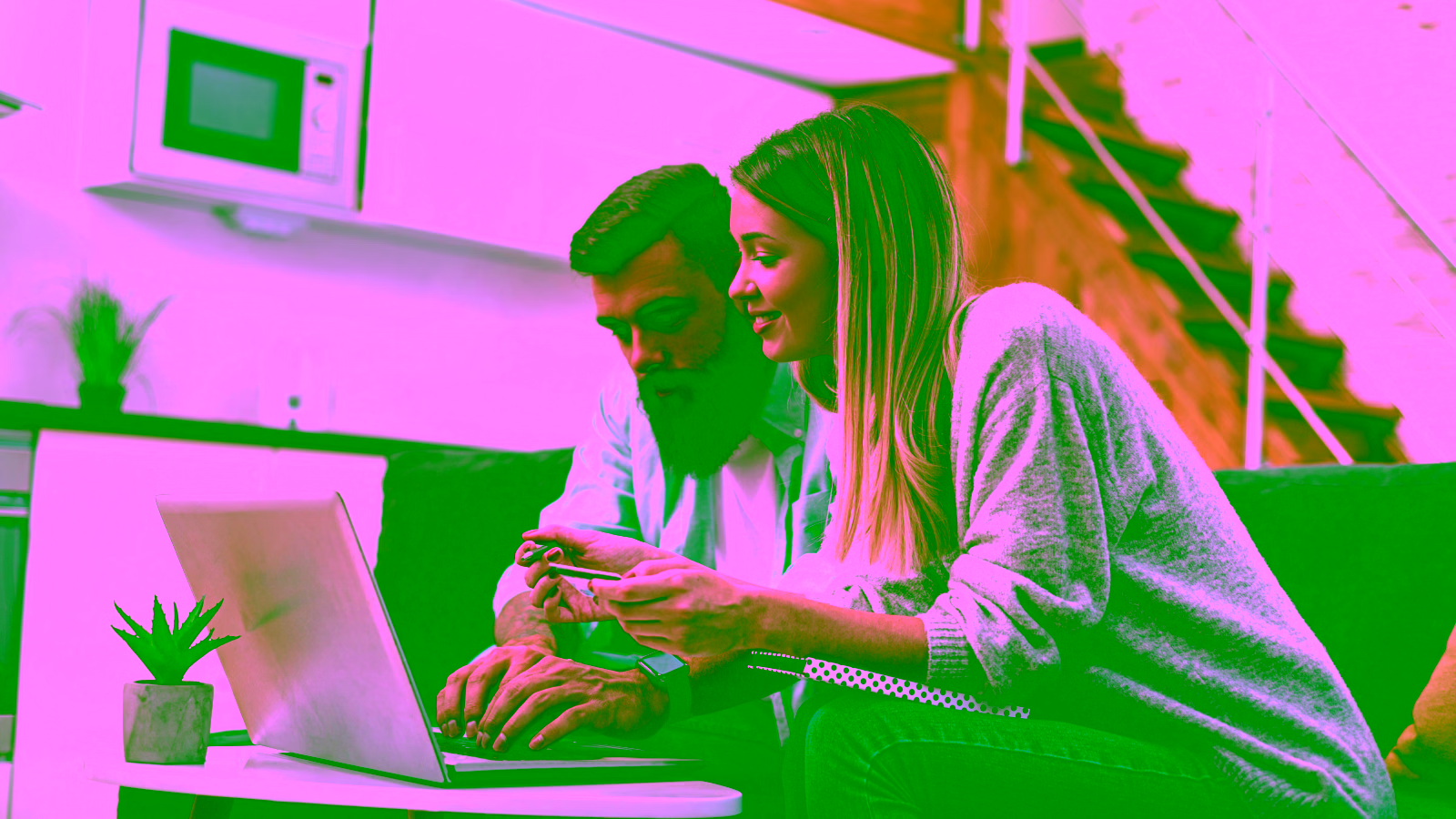 Couple using a laptop