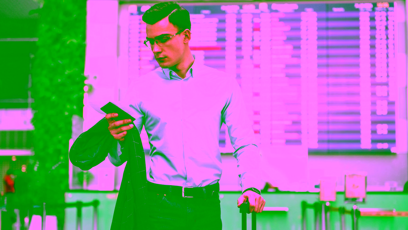 Man checking flight information at airport