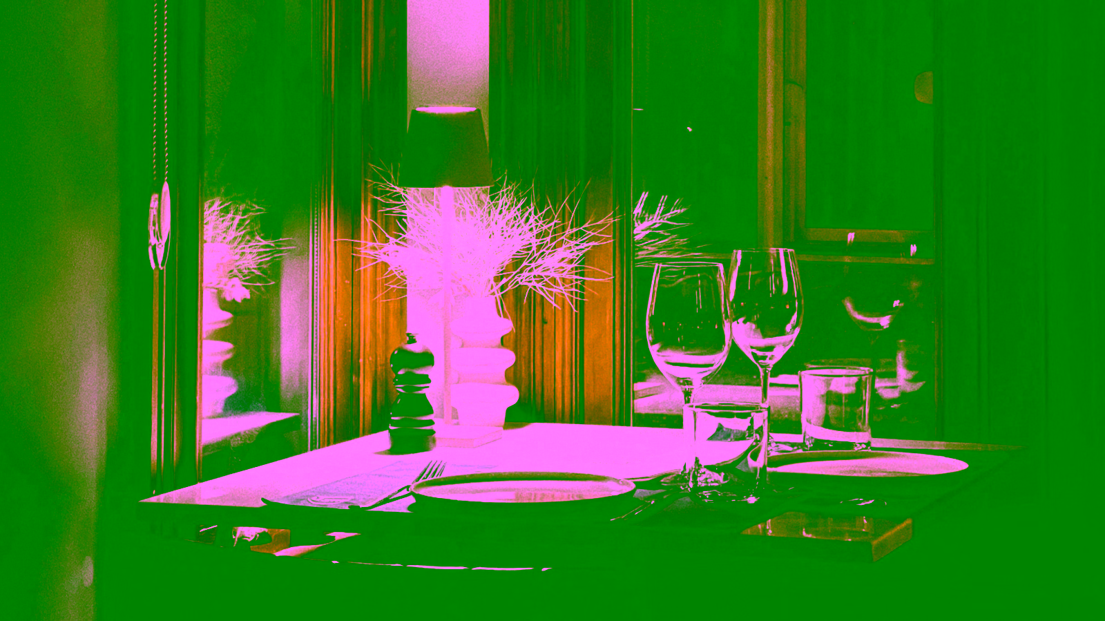 Elegant restaurant table setting with wine glasses