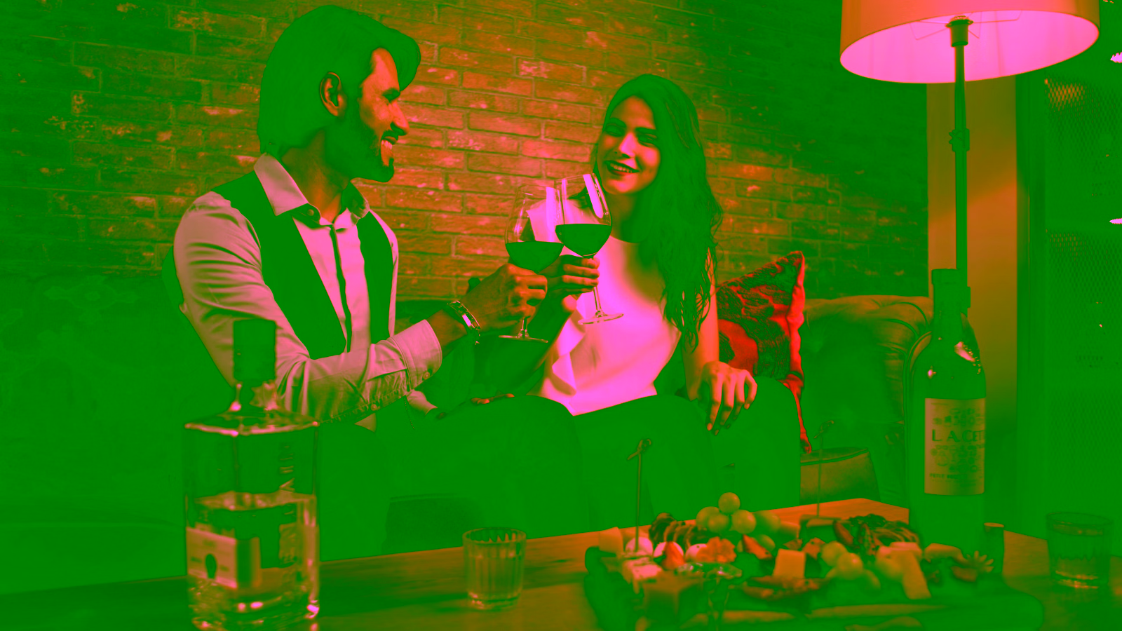 Couple enjoying wine and dinner together