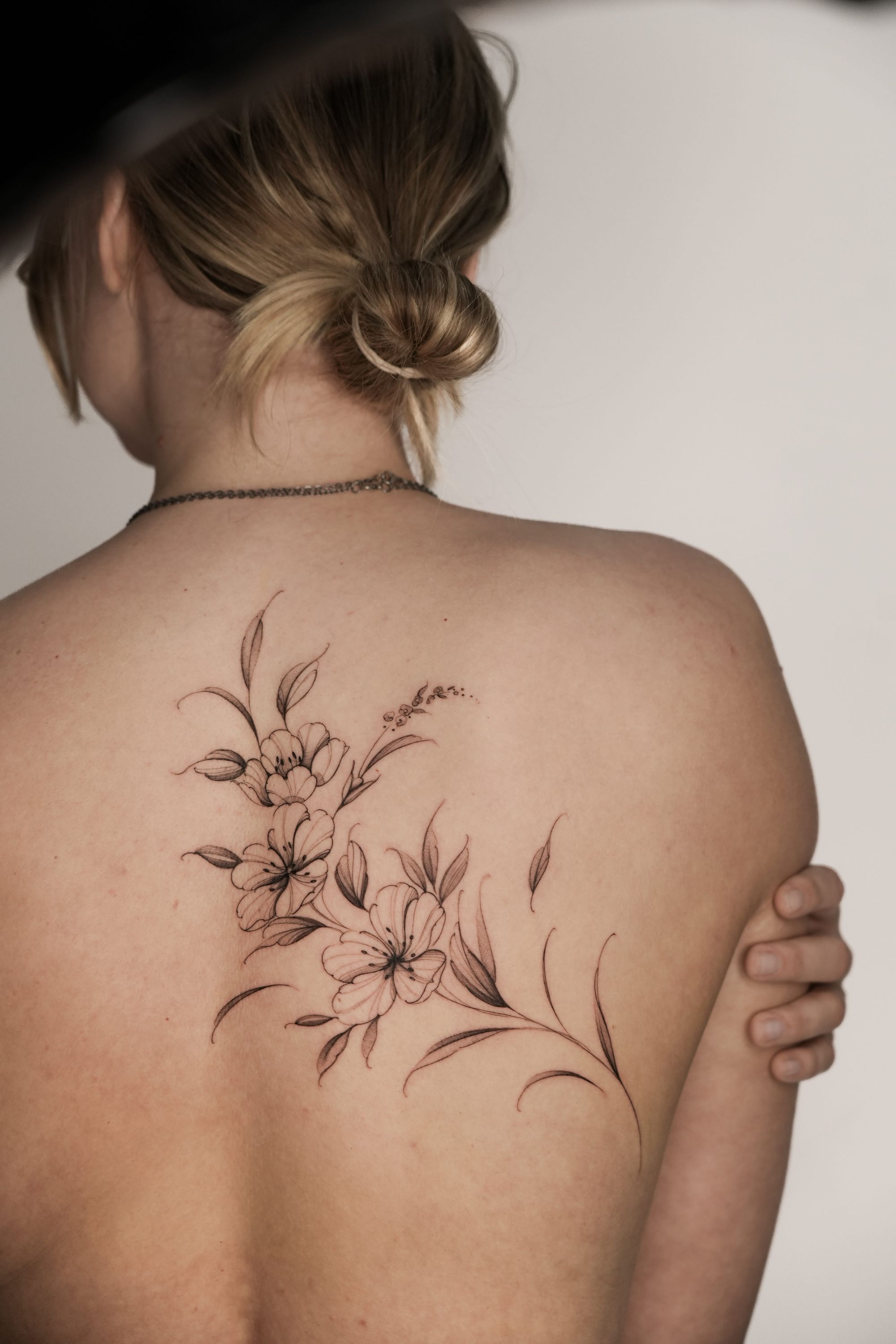 Delicate tattoo by Monique