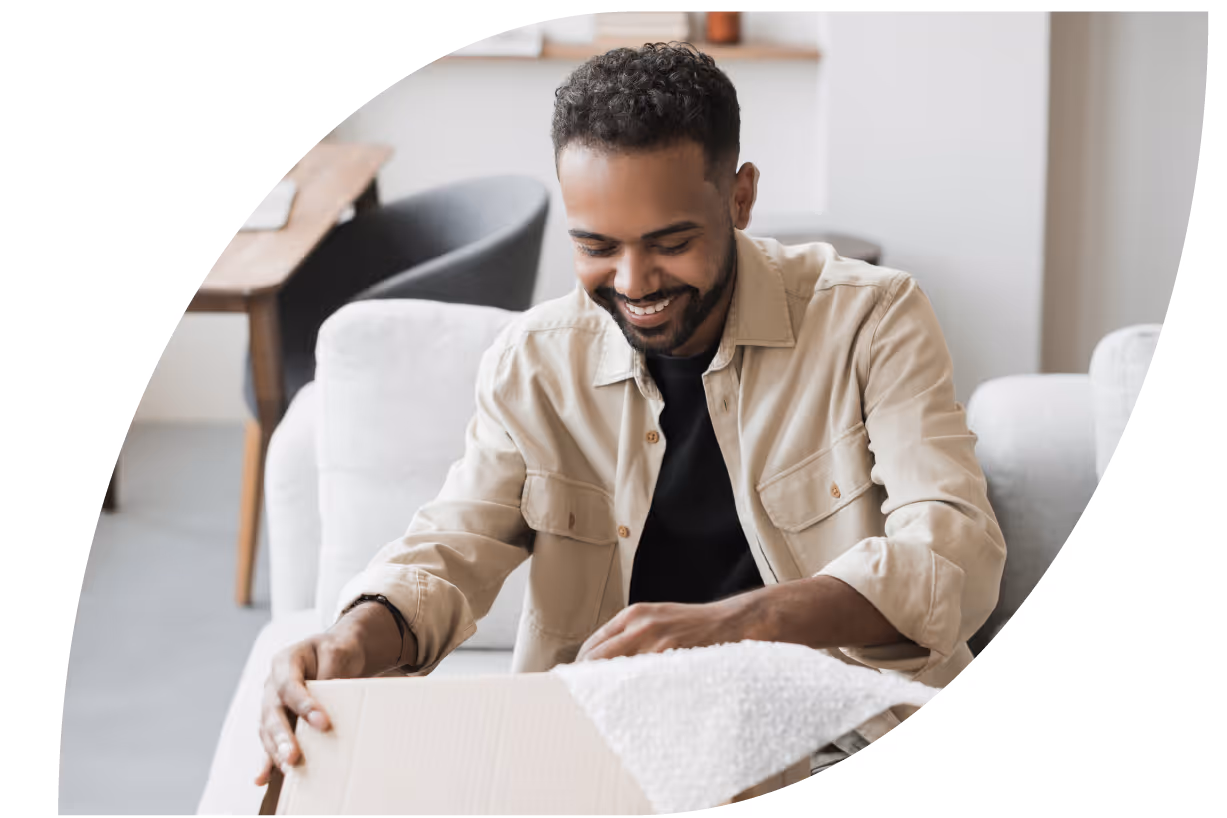 Image of man opening a package