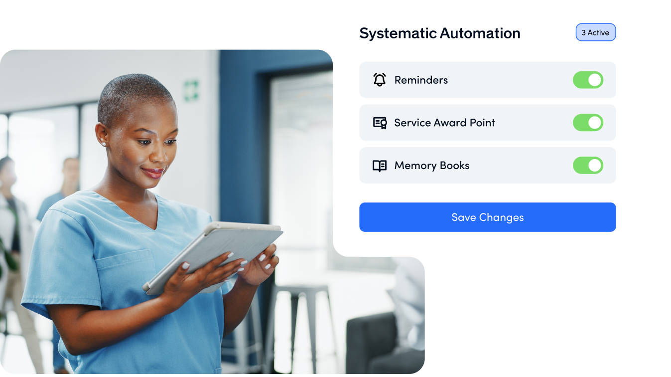 Employee in healthcare looking at tablet with automations for reminders and service awards