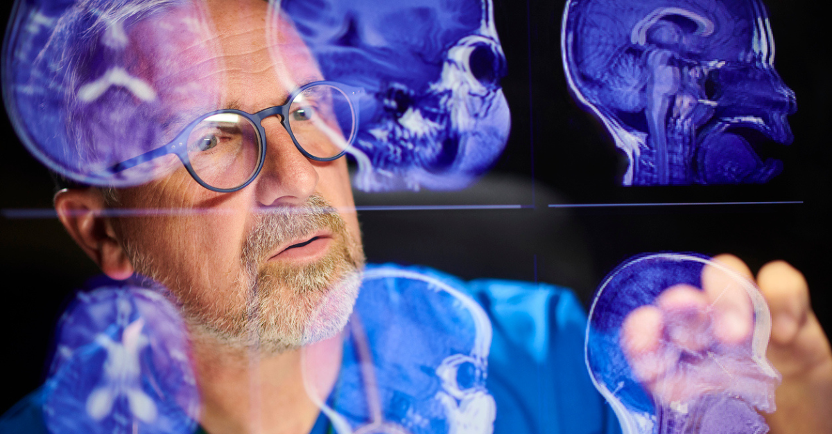 A medtech professional viewing the results of a medtech process