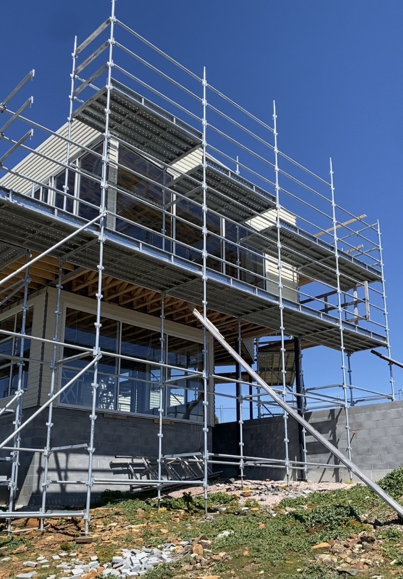 An image of a pile of Kwikscaff scaffolding equipment.