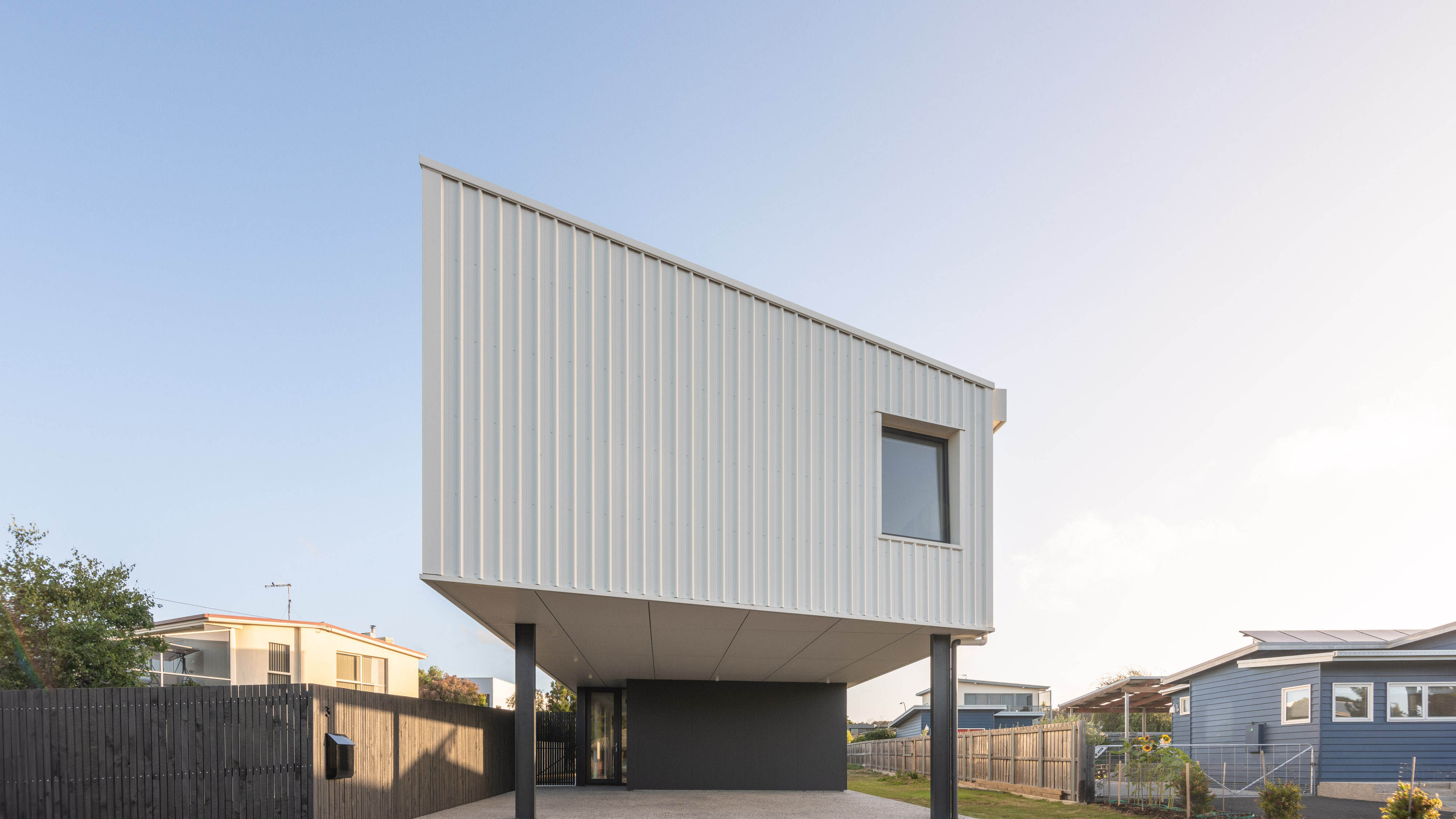 External image with of a white and dark grey coloured house.