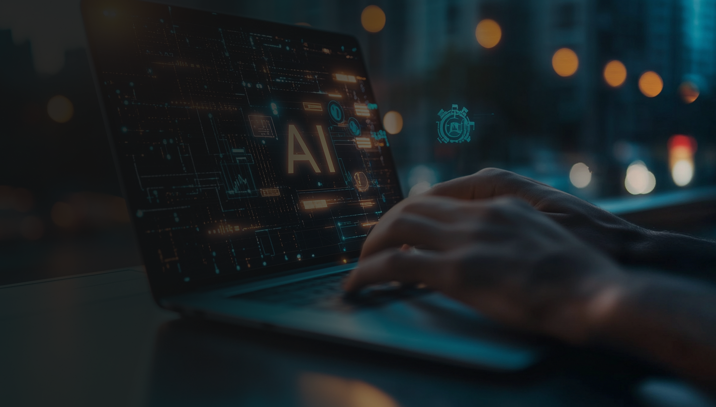 Person typing on laptop displaying AI and digital data graphics on screen.