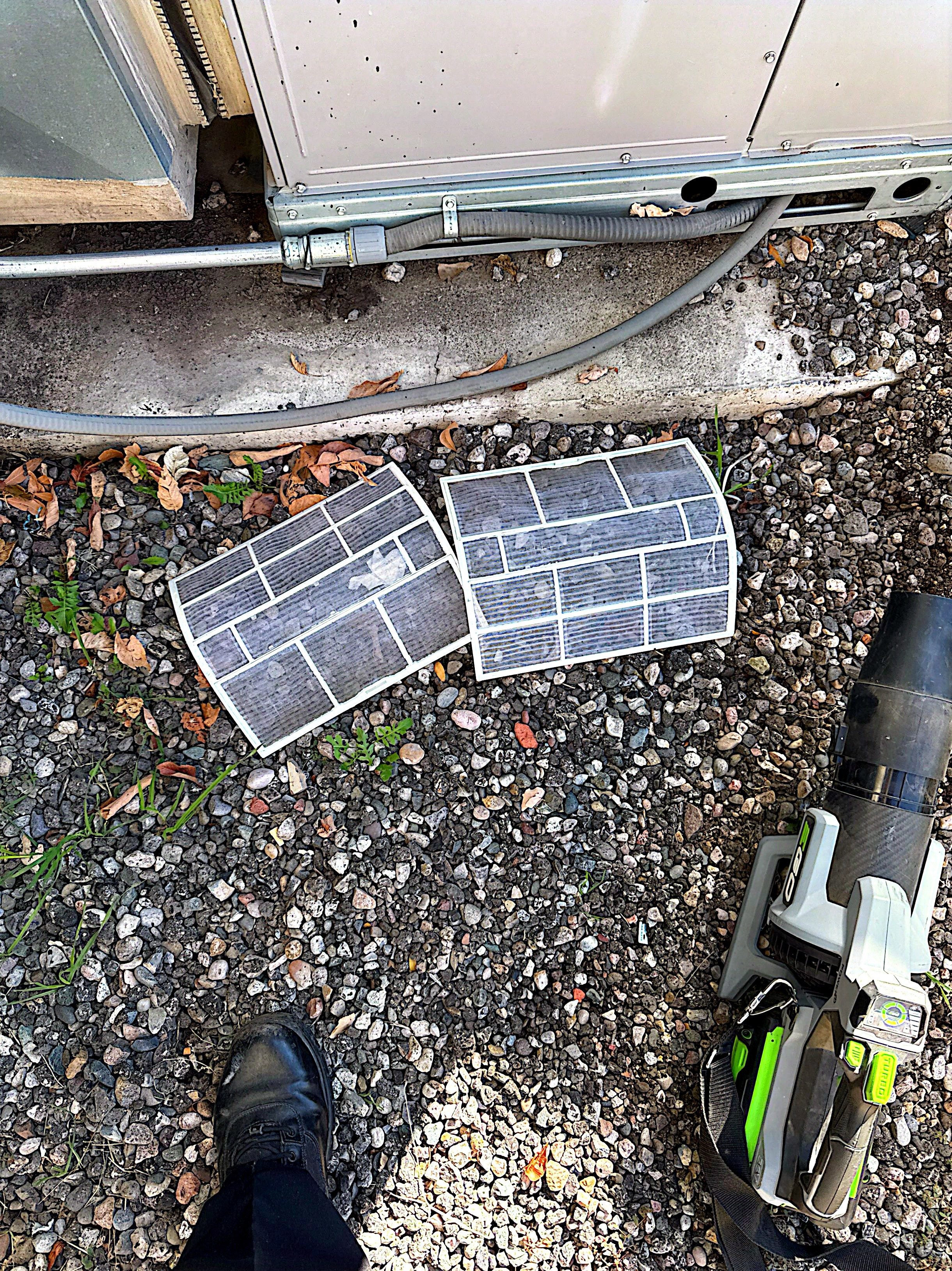 AC maintenance in Albuquerque, NM cleaning coils and filters.