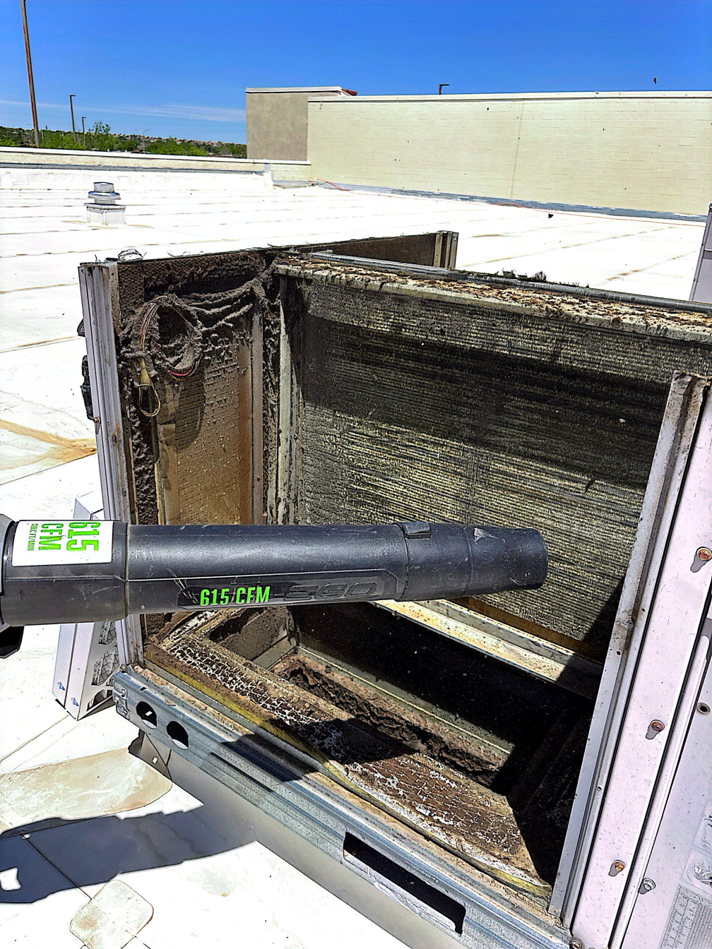 AC repair near Coronado Center in Albuquerque, NM rooftop HVAC cleaning.