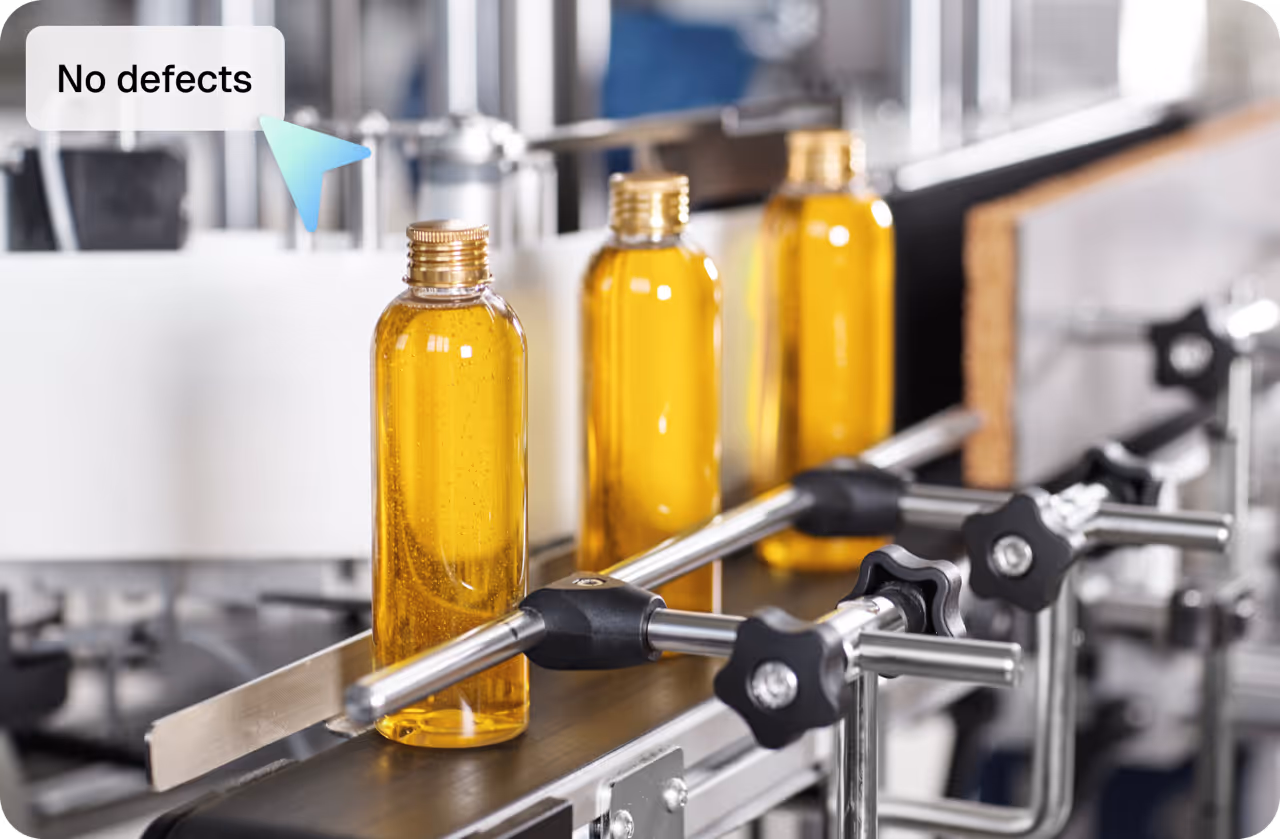 Robotic arms assembling car body frames on an automated automotive production line.