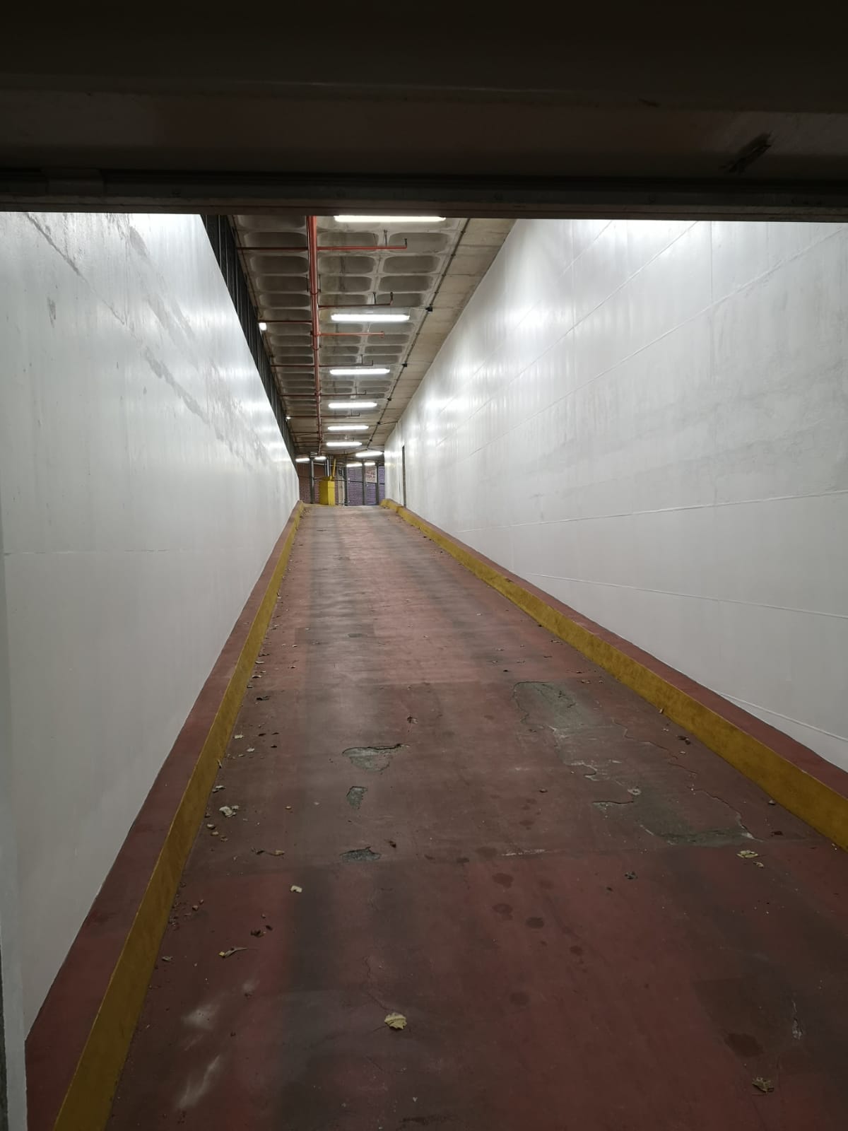 Car park ramp at Harrogate Conference Centre with repainted walls and floor