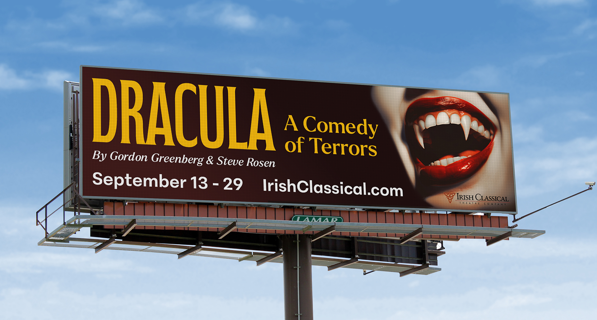  A billboard for Dracula, A Comedy of Terrors at the Irish Classical Theatre, with the image of a vampire's fangs.