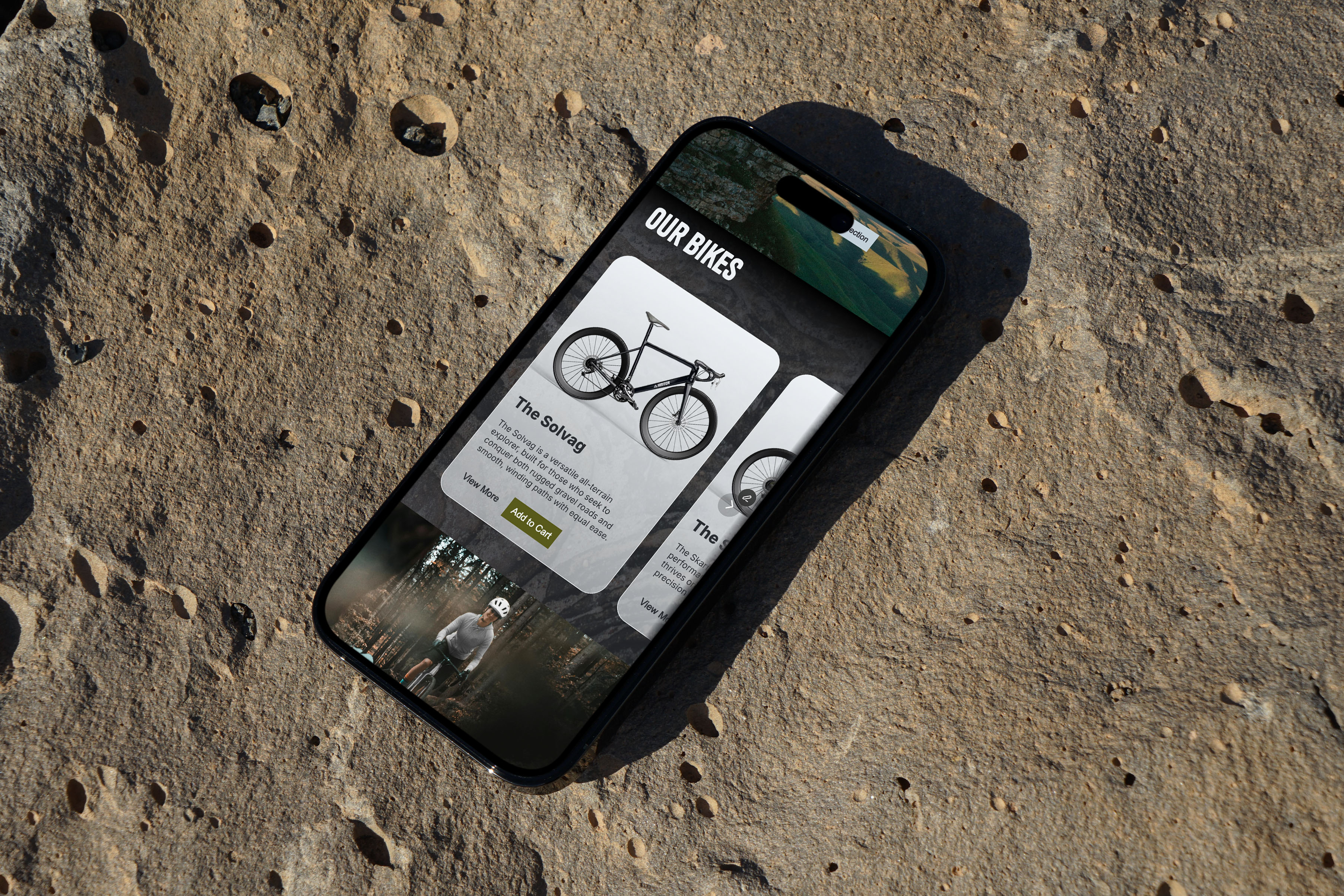 A phone showing the Our Bikes section of the Hinter website