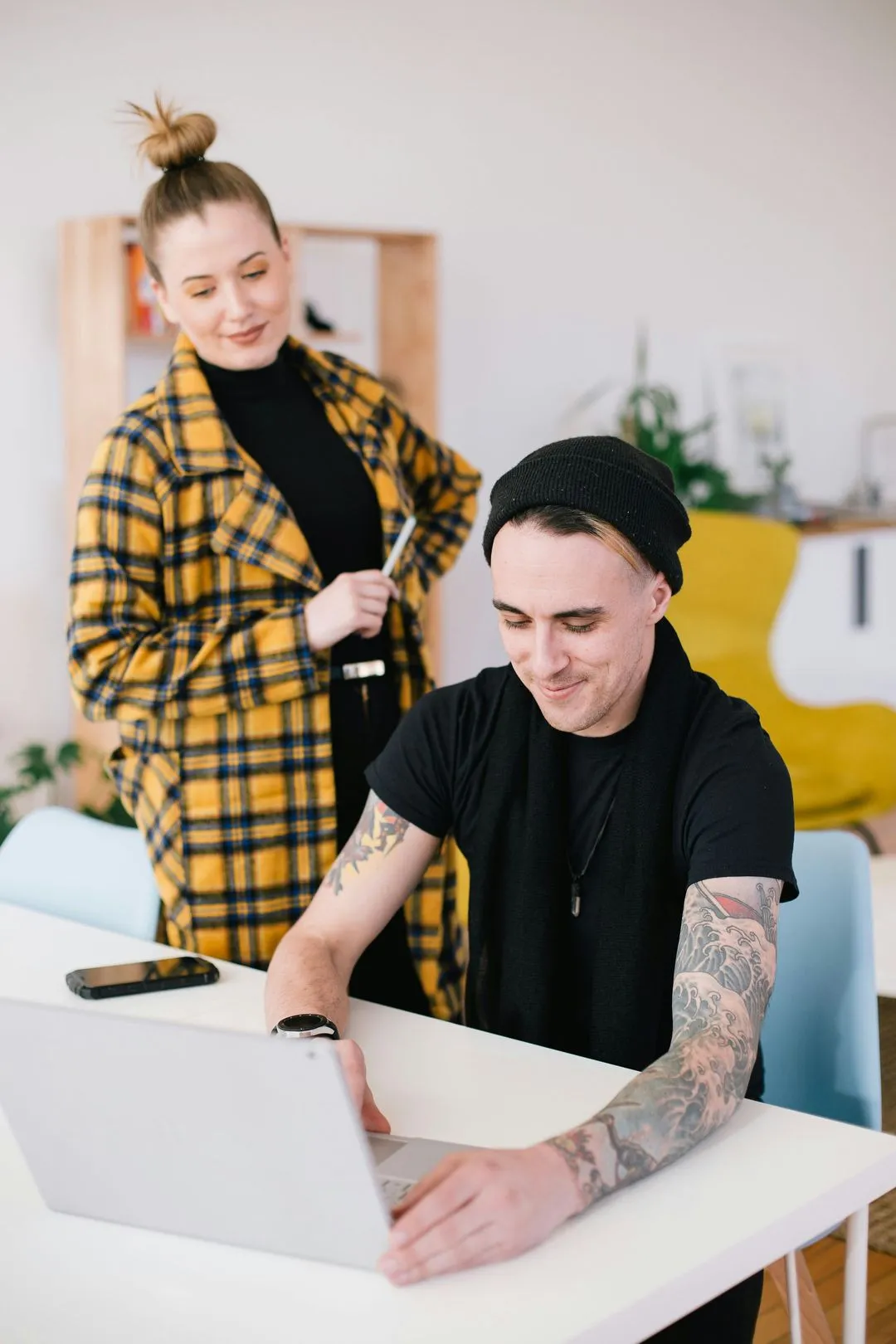 man and woman working together