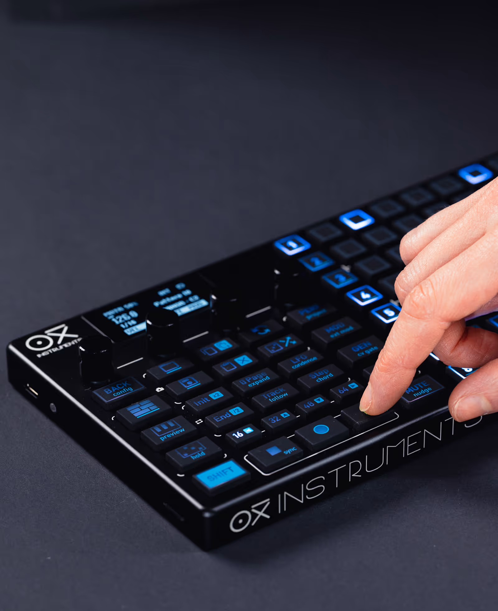 OXI ONE MKII, with hand, image, avif