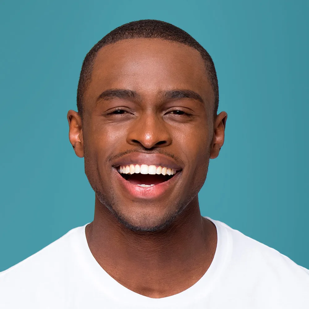 A close up of a person wearing a white shirt.