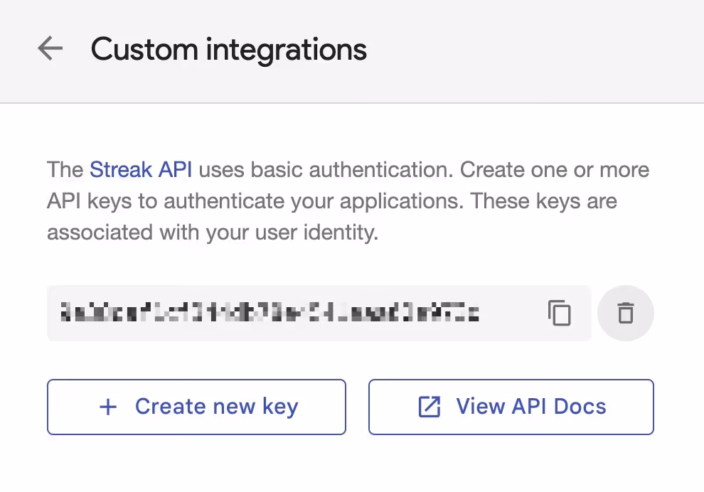 a Streak API key is blurred out, but shows options including a delete button