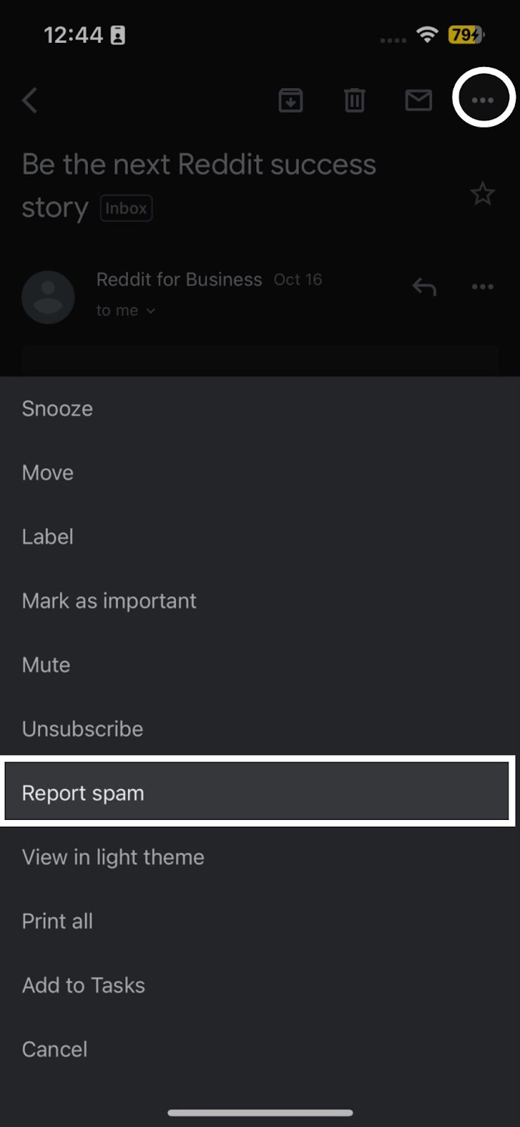 A screenshot of Gmail email thread on dark mode in mobile device displaying the More menu with the "Report spam" function