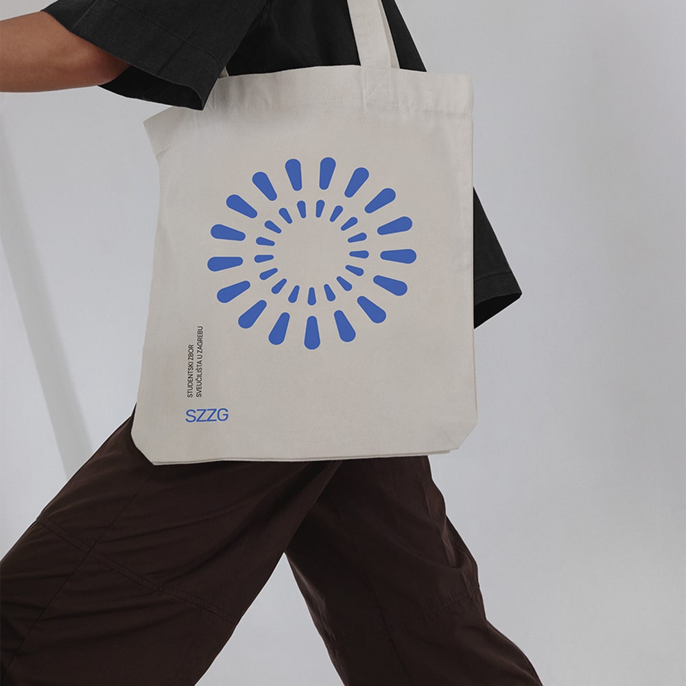 image of aperson wearing tote bag with big logo