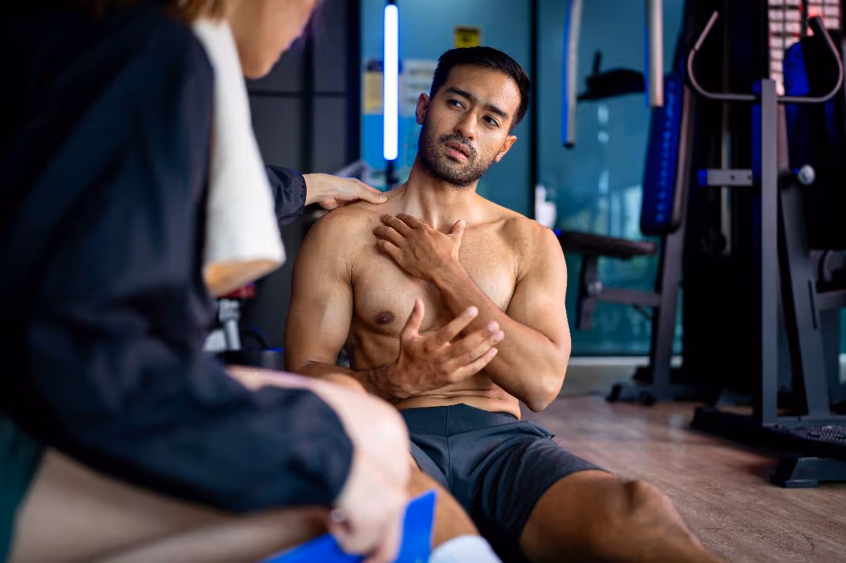 active adult with shoulder impingement pain in Georgetown Washington DC athletic facility