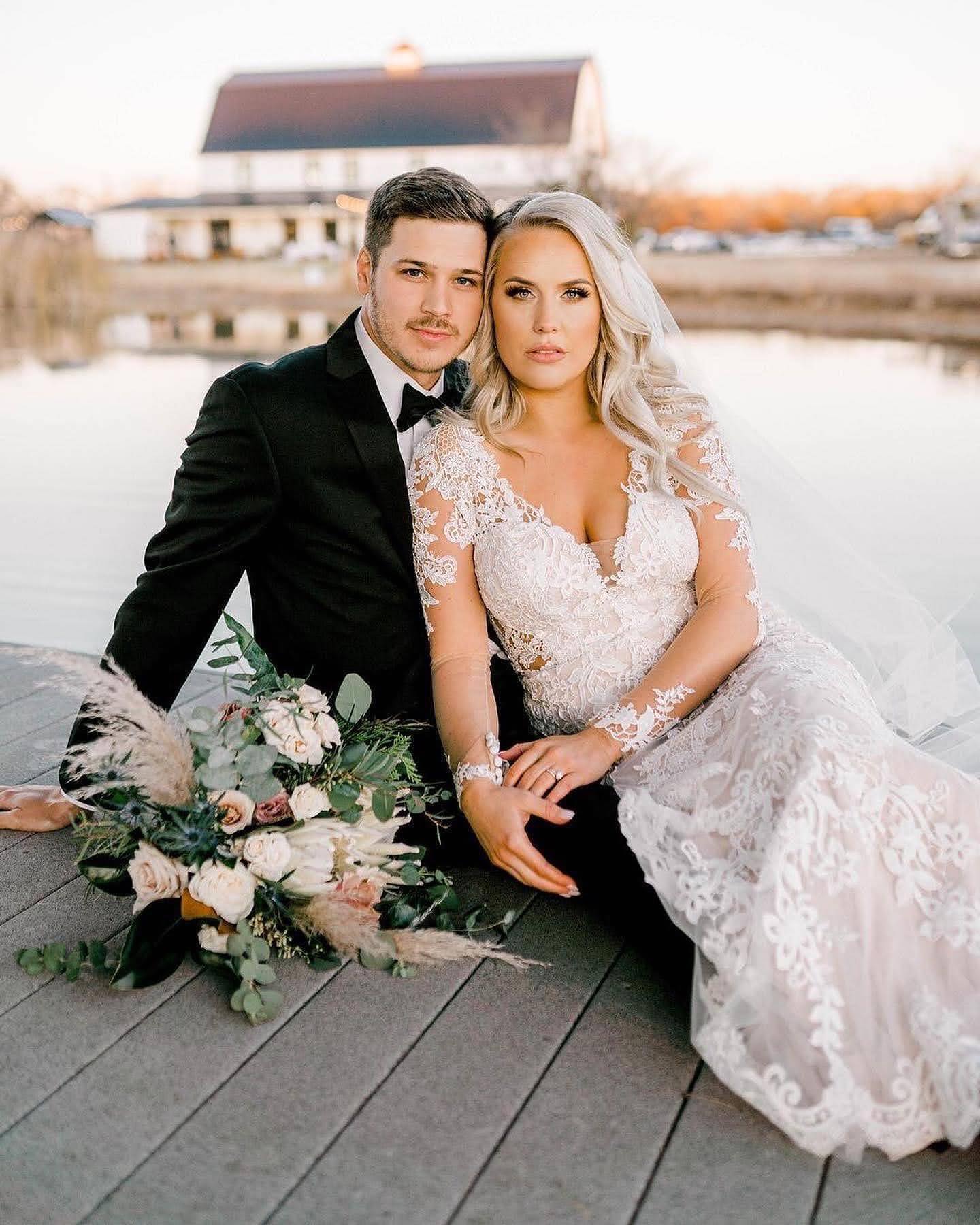 Wedding couple sharing a kiss overlooking the Sierra Nevada mountains at Forest House Lodge